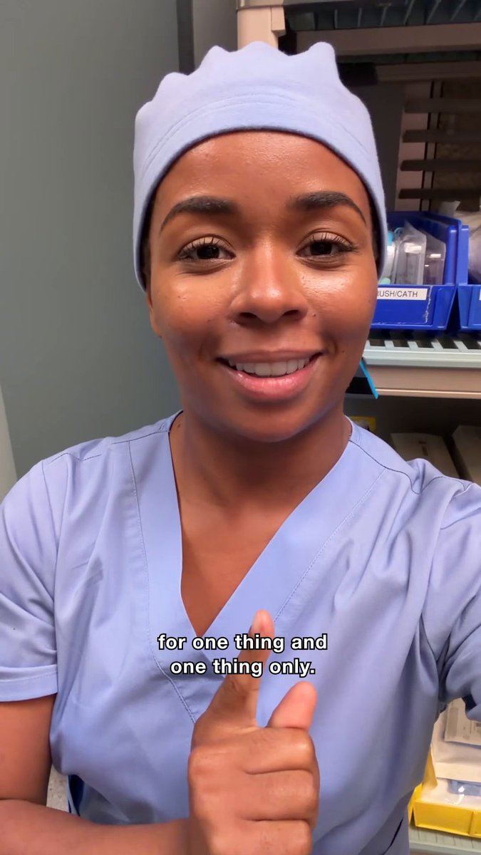 A healthcare worker in blue scrubs and a surgical cap smiles warmly while pointing her finger upward, with the caption "for one thing and one thing only" displayed across her scrubs. The image accompanies a post encouraging viewers to text "HARRY to 21523" to vote for Harry on Dancing with the Stars, with her enthusiastic gesture emphasizing the urgency of the message.