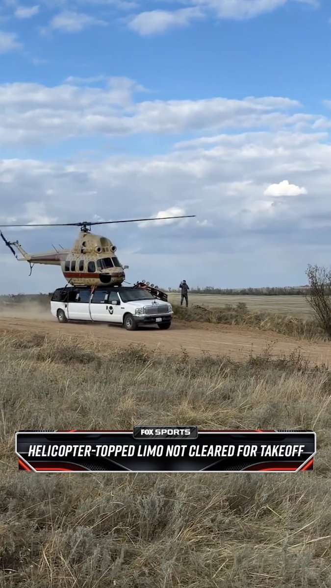A white limousine topped with a mounted helicopter drives down a dusty dirt road, accompanied by the Fox Sports caption 'HELICOPTER-TOPPED LIMO NOT CLEARED FOR TAKEOFF'.