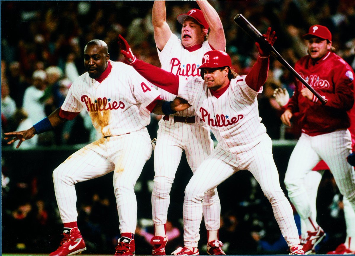ShenkLarry's tweet photo. OTD 1993: After making an error in the ninth inning that helped the Braves to tie the game, Kim Batiste drives in John Kruk with the winning run in the bottom of the 10th as the Phillies open the NLCS with a 4-3 win before a raucous Veterans Stadium crowd. #phillies https://t.co/CW5ltTMcYC