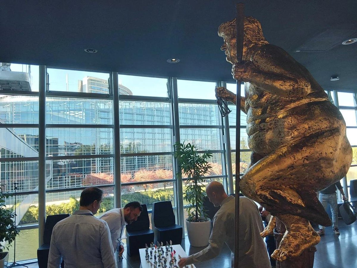 UsUn583176's tweet photo. #A " #Plague " #Looms #Over #the #European #Parliament : A Gilded Statue of a Naked Trump Titled "The Orange Plague" Has Been Displayed in the Building A satirical sculpture by Danish artist Jens Galschiøt has been installed in one of the busiest areas of the European Parliament https://t.co/3P54b8yyug