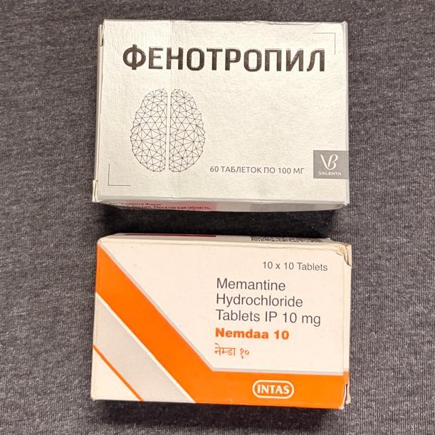 biohackerziv's tweet photo. Phenylpiracetam + Memantine is the goated duo and can replace 10+ junk meds and supplements you are currently taking for productivity, focus, ADHD and anxiety.

Here is the science👇

1. Phenylpiracetam, or fonturacetam, is piracetam with a phenyl ring. That ring is why it is a drug. Absorption is near complete, onset is under an hour, it leaves mostly unchanged, and the half-life is about 5 hours. The effect often outlasts the blood level and runs 10–12 hours.

The R-enantiomer blocks dopamine reuptake and also blocks norepinephrine reuptake, with about 11-fold lower affinity at NET than at DAT. The S-enantiomer is more DAT-selective. A pharmaceutical racemate therefore raises dopamine, and through the R-half raises noradrenaline. That is the start-and-hold effect. It also binds nicotinic receptors, including α4β2 in the low-micromolar range, so attention has a cholinergic layer on top of the catecholamine layer.

It potentiates AMPA. Chronic use has been reported to increase NMDA receptor density. That is the nerf. A few good days, then more glutamate receptors, more spillover, anxiety, lighter sleep, and a faded response. Daily tolerance is the expected result.

It also raises high-affinity choline uptake, the step that pulls choline in for acetylcholine. The nicotinic receptors it binds then have more acetylcholine to use. 

Repeated dosing has been reported to increase dopamine receptor density, so the DAT block is not only a same-day spike. The receiving side is being built while the transporter is held.

2. Memantine blocks the NMDA channel only after glutamate has opened it. At human GluN1/GluN2A receptors the IC50 is about 0.8 μM at −70 mV. Block is voltage-dependent and fast. About 20 percent stays trapped after the agonist leaves.

Magnesium already blocks the resting channel. Memantine adds a filter on channels that stay open too long. Brief, normal transmission is mostly spared. Sustained glutamate is what it cuts.

It is also a 5-HT3 antagonist and a nicotinic antagonist, including at α7. Half-life is 60–80 hours, mostly unchanged in urine. A dinner dose is still there the next afternoon. Steady state takes days.

5-HT3 receptors sit on cholinergic, GABA, and dopamine terminals. Serotonin at 5-HT3 suppresses cortical and hippocampal acetylcholine and pushes gut and mesolimbic signaling. Blocking it takes that brake off acetylcholine, which is why 5-HT3 antagonists were studied for cognition, and it cuts the nausea and visceral anxiety from the same receptor.

3. Alone, each one fails.

Phenylpiracetam alone pushes dopamine and noradrenaline into a cortex whose AMPA and NMDA tone is also rising. Focus comes with anxiety, then insomnia, then a flat day three. The rise in NMDA density is the adaptation. You are training the noise channel while you chase the drive. Caffeine or another racetam does not close it.

Memantine alone closes the noise and leaves dopamine where it was. If the problem is "cannot start", a quieter cortex still cannot start tasks. Word-finding dulls. Motivation does not appear. That is the blunting people quit over.

4. The pair splits the jobs.

Phenylpiracetam holds DAT and, through the R-enantiomer, NET for the work window. Memantine is already filtering NMDA from the night before. Dopamine lands on a glutamate system that can still fire normally and is less able to run away. Anxiety drops because the runaway was NMDA. Sleep holds because memantine is a cap on overnight glutamate, not a sedative.

Tolerance slows for the same reason. Stimulant fade is largely glutamate adaptation and sleep debt. Keeping NMDA overactivity down while the DAT block is intermittent removes the pressure that grows the noise channel.

5. What this duo achieves:

Phenylpiracetam raises dopamine, noradrenaline, choline uptake, increase dopamine receptor density, so initiation, motivation, and the acetylcholine needed to encode the task all go up. Memantine keeps NMDA from running past the signal, which is the substrate of OCD looping and the mental replay that burns a work block on the same thought. With that loop cut, working memory holds one item instead of every item, anxiety does not steal the block, and the next day is not a flat rebound. The result is faster task start, fewer returns to the same worry, longer hold on one problem, cleaner recall of what you just did, and less of the scattered speed that feels like focus and produces nothing.

Pair this stack with 1 g NALT (N-acetyl L-tyrosine), 500 mg CDP-choline, a good B-complex(with high p5p), a trace mineral complex, and an ADEK complex (IdeaLabsDC EstroBan) to get the best effects.

This stack does not replace a solid baseline: adequate sleep, foundational cofactors, nutrients, etc.
