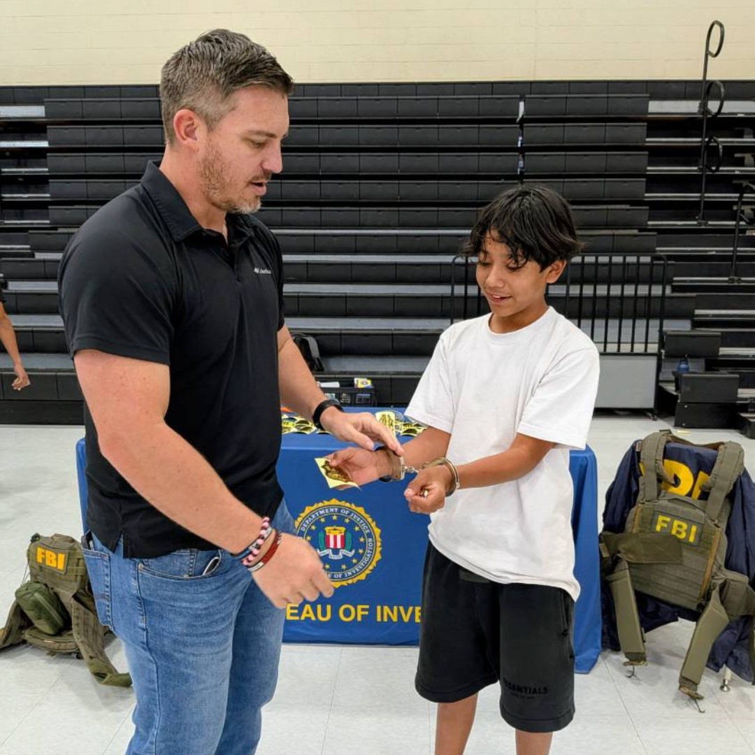 FBIPhoenix's tweet photo. FBI Phoenix had a great time talking with students at Estrella Middle School at the College and Career day. We showed them gear, highlighted different careers and told them what it takes to work at the FBI.

Hopefully we didn't scare them too much by showing what happens if you are on the wrong side of the FBI.