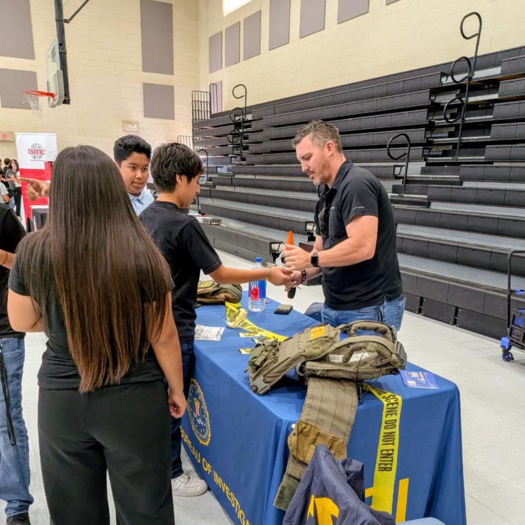FBIPhoenix's tweet photo. FBI Phoenix had a great time talking with students at Estrella Middle School at the College and Career day. We showed them gear, highlighted different careers and told them what it takes to work at the FBI.

Hopefully we didn't scare them too much by showing what happens if you are on the wrong side of the FBI.