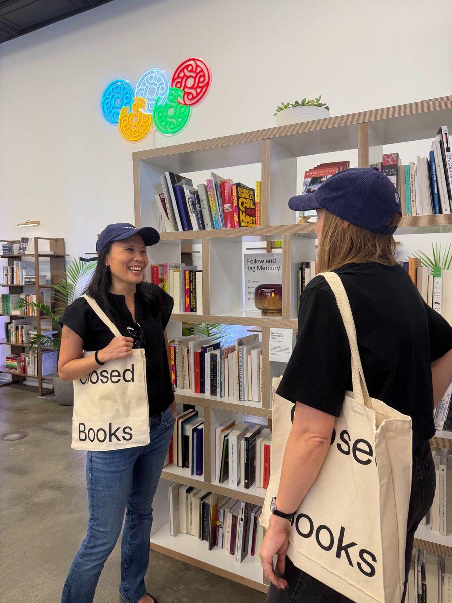 mercury's tweet photo. Spotted at #sftechweek, closed books on your shoulder and "I love Books" on your head. Grab both at the Mercury Bookstore while supplies last. https://t.co/aoMqetx1Z7
