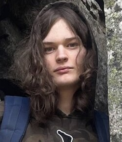 MrAndyNgo's tweet photo. James Cody Bryant, the man federally charged in Washington state for allegedly helping the Canadian trans school mass sh—ter Jesse van Rootselaar (pictured below) kill seven women and children in Tumbler Ridge, is trans and uses the name "Melody," or "Mel." 

The criminal complaint shows one of the conversations between the two trans radicals before the February 2026 mass sh—ting. "U can post them if I die," the shooter wrote.

Rootselaar shared photos of himself posing in a miniskirt with magazines and the tactical gear he intended to use in the school shooting. Bryant allegedly gave him advice on how to prepare for the attack and sent him money for gear.

Other exchanges in the court document show how Rootselaar didn't want his mother knowing Bryant's "deadname" if he sent money on PayPayl, and discussing how a Pride flag was part of his gear.

The sh—ting ended up being one of the deadliest in Canadian history. Canadian police and media described the killer as a "female in a dress," with the press continuing to refer to Rootselaar as a woman. So far, the media is not reporting that Bryant is trans. 

I wrote about the Tumbler Ridge sh—ting in my new book about trans violence. This phenomenon shows no signs of slowing down. https://t.co/eruxyD69G9