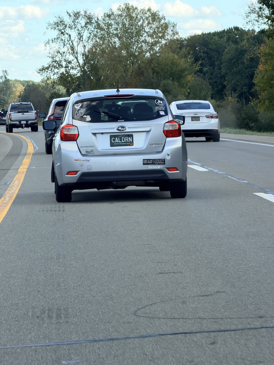 MeshawnMaddock's tweet photo. “BORN AGAIN VOODOOIST”
sticker with CALDRN vanity plate. I can’t begin to describe what she looked like while I passed and put her swiftly in my rear view and prayed she does not work anywhere near children. Or food. Or people. I hope she’s on disability. https://t.co/Jp8ld3NUxH