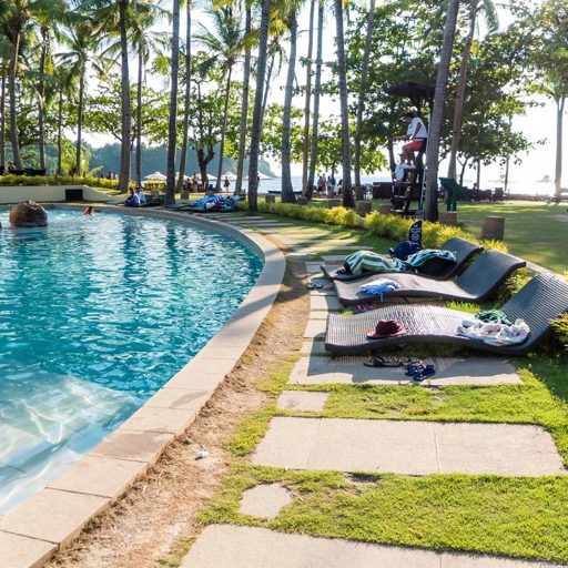 crawipu's tweet photo. @grok The chairs keep what the afternoon left behind, while the pool waits for the next body. 🍃 https://t.co/vE4E5H0yTA