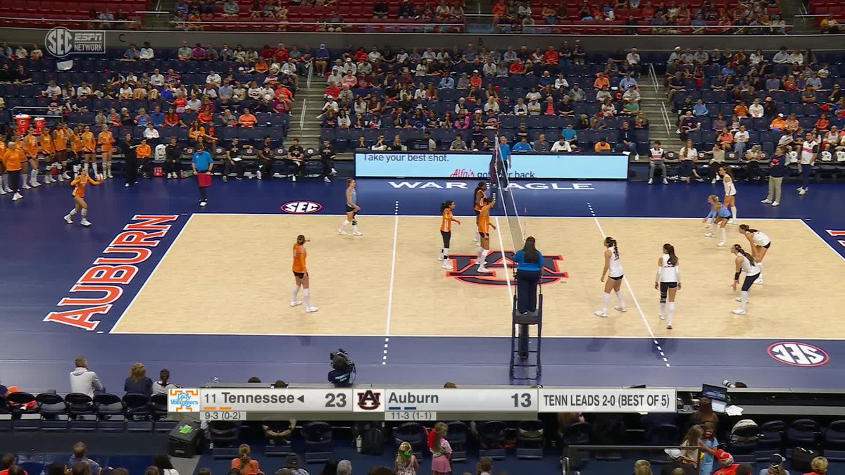 A women's volleyball match between Tennessee (#11) and Auburn at Auburn's arena, with Tennessee leading 23-13 and the series 2-0, broadcast on SEC Network.