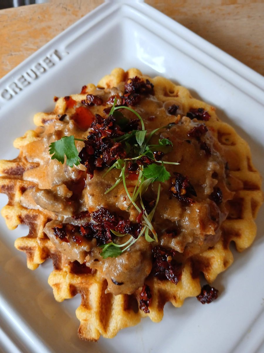NotYourAvgBliss's tweet photo. Cornbread waffle and sausage gravy.  Plain or spicy with chili crisp in the gravy and also as a garnish.   Just a goofball experiment to use up the sausage and buttermilk. https://t.co/YnZyLz5FOA