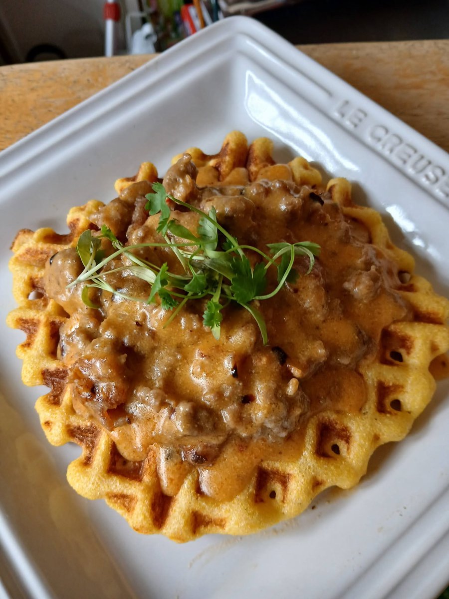 NotYourAvgBliss's tweet photo. Cornbread waffle and sausage gravy.  Plain or spicy with chili crisp in the gravy and also as a garnish.   Just a goofball experiment to use up the sausage and buttermilk. https://t.co/YnZyLz5FOA