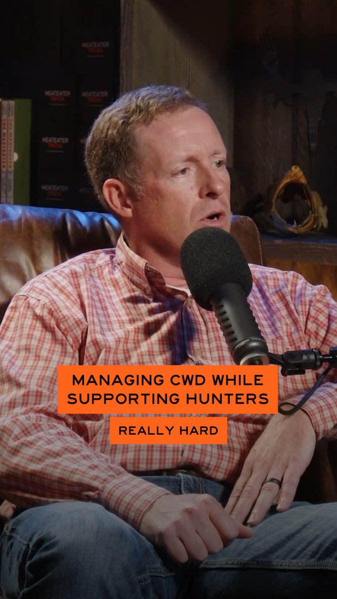 A man in a red and white plaid shirt speaks into a microphone on a podcast, with text reading 'MANAGING CWD WHILE SUPPORTING HUNTERS REALLY HARD.'