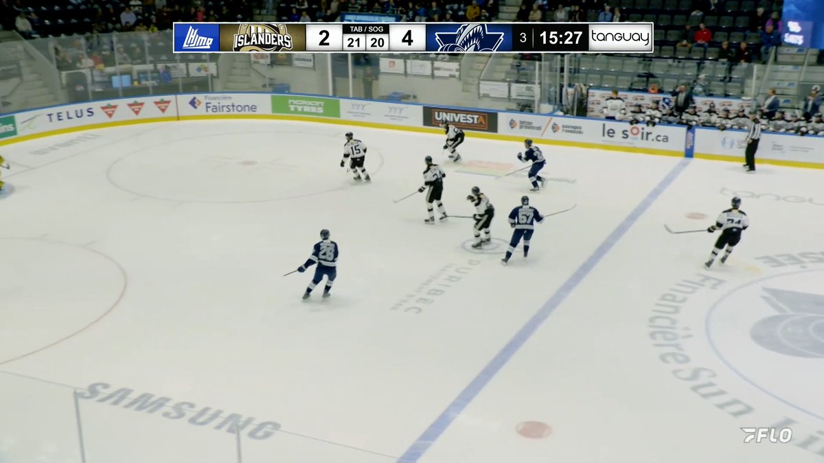 An ice hockey game broadcast shows the Islanders trailing the opposing team 2-4 with 15:27 remaining in the period 3, shot count 21-20.