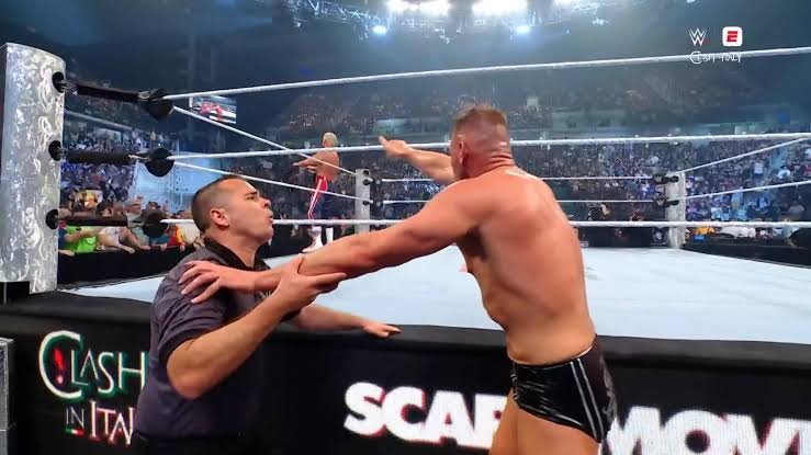 DFW_Wrestling's tweet photo. @MattDFW1 @NathanLeeDFW He walks onto the entrance ramp, The camera shows Mat Siegmar at ringside absolutely IRATE, Complaining to the referee.

As Nathan Lee takes the World Heavyweight Championship, He holds it up high. But suddenly -

THE CAMERA GOES PITCH BLACK. https://t.co/FXaG7DCzpj