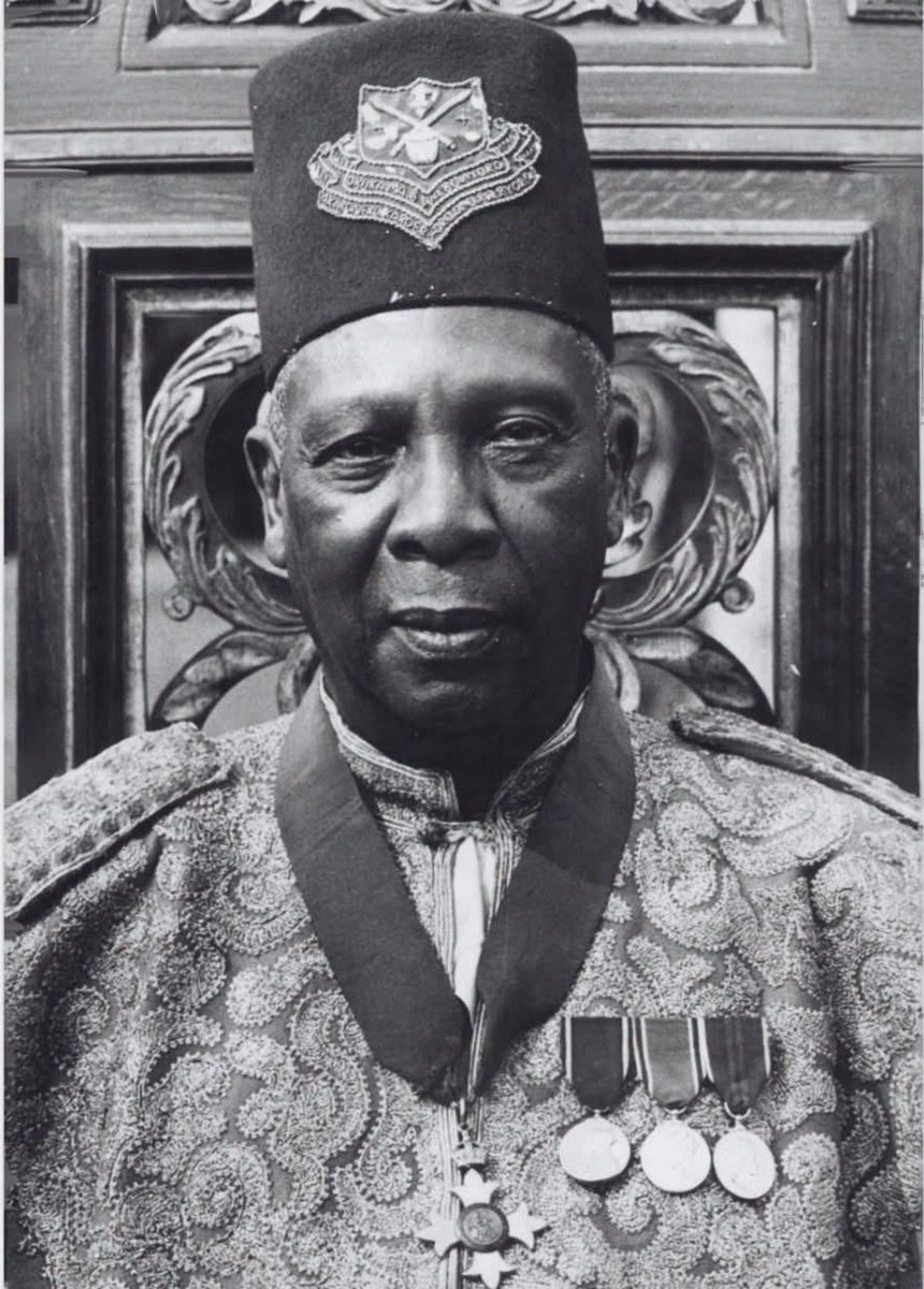 lulanzeashirafu's tweet photo. A British official portrait of Sir Tito Gafabusa Winyi IV, C.B.E., Omukama of Bunyoro-Kitara, a prominent African traditional ruler in Uganda during the colonial period, as issued by the Central Office of Information, London.

A son of the celebrated Omukama Chwa II Kabalega, Tito Winyi succeeded his elder half-brother, Duhaga II, in 1924 and was formally installed as Omukama on 12 April that year. Before becoming king, he had received a modern education at Mengo High School and Kings College Budo, worked briefly in the colonial administration and served as a sub-county chief at Bwijanga. He had also spent several years in the Seychelles as his father Kabalega’s private secretary during Kabalega’s long exile.

Winyi inherited a kingdom whose political and territorial position had been profoundly altered by British conquest. Bunyoro had lost substantial territories during the colonial reorganisation of Uganda, including the territories later remembered by Banyoro as the “Lost Counties.” His reign was therefore marked by the difficult task of preserving Bunyoro’s institutions, political identity and royal authority within the Uganda Protectorate. In 1933 and again in 1955, agreements between the British government and Bunyoro formally defined the position of the Omukama and the Rukurato, the kingdom’s traditional governing council.

Winyi also cultivated a reputation as a modernising and unusually diplomatic monarch. He travelled to Buganda, Ankole, Kigezi and Toro, breaking with older conventions that discouraged kings from visiting one another, and became the first Omukama recorded as travelling by aeroplane. During the Second World War he travelled extensively through East Africa in support of the Allied war effort.

His relationship with the British colonial establishment was sufficiently close for him to receive the Commander of the Most Excellent Order of the British Empire (C.B.E.) in 1934, presented by Uganda Governor Sir Bernard Bourdillon. He later travelled to Britain in 1948 and returned in 1953 as Bunyoro’s representative for the coronation of Queen Elizabeth II.

Winyi remained Omukama until 1967, when President Milton Obote abolished Uganda’s traditional kingdoms. He died in 1971. His son, Solomon Gafabusa Iguru I, was later installed as Omukama when Uganda’s traditional institutions were restored in 1993–94.

#Uganda
#AfricanHistory