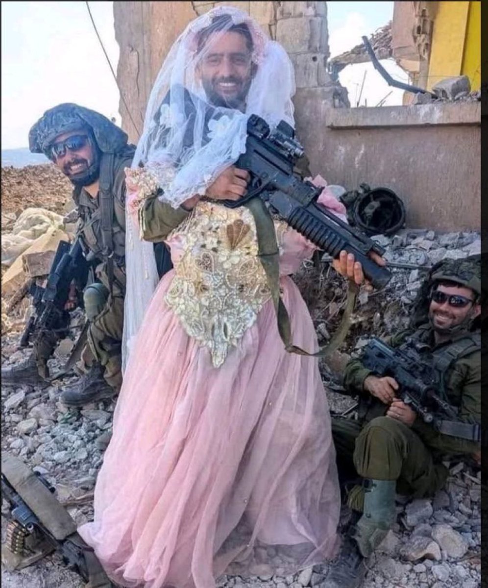 drhossamsamy65's tweet photo. ⛔️An Israeli soldier who stole a wedding dress from a home in Gaza and took photos wearing it while mocking Palestinian women‼️

⛔️What do you call this behavior ‼️ https://t.co/EqT60eSnM5