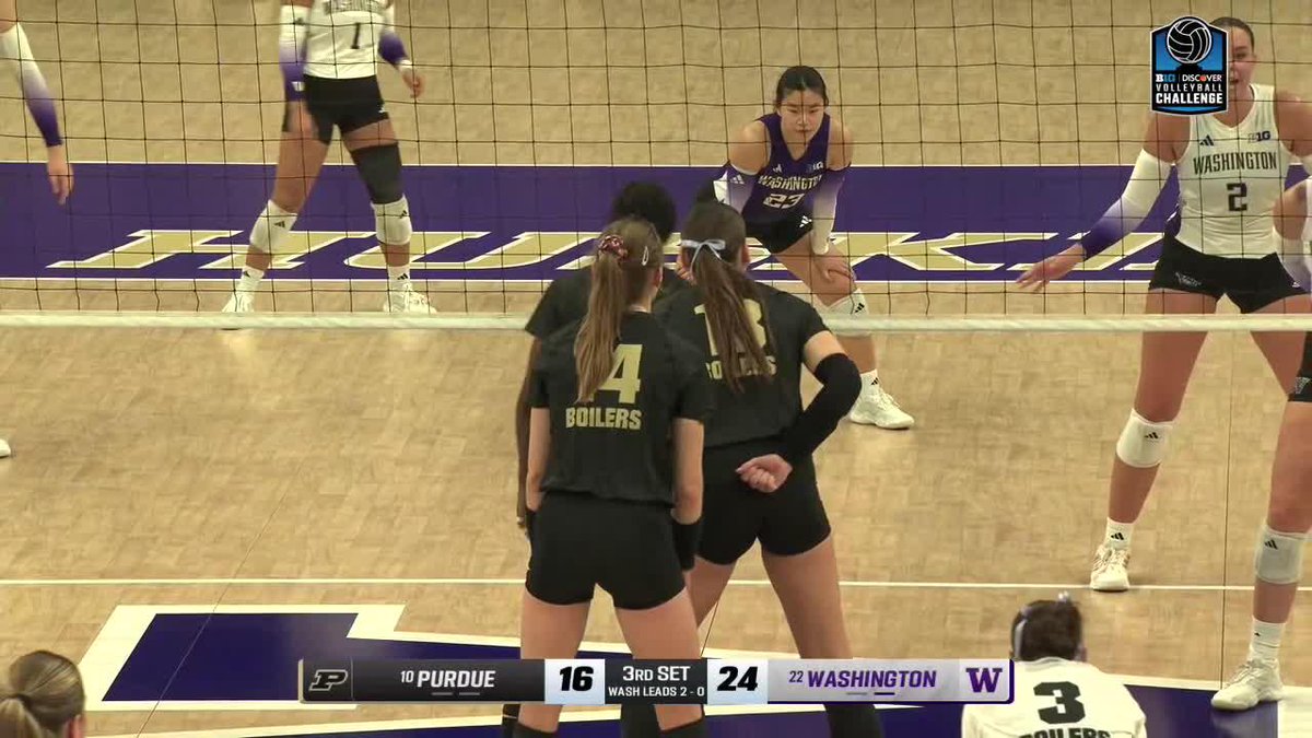 A volleyball match between #10 Purdue (16) and #22 Washington (24) during the 3rd set, with players visible at the net and the Big Ten Volleyball Challenge logo in the corner.