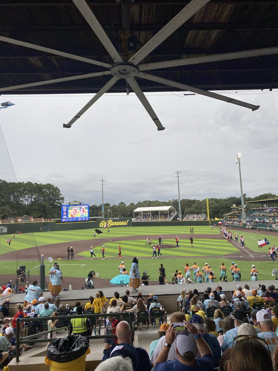 postcrunk's tweet photo. at the savannah bananas game. they’re holding up a baby in a potato costume and chanting “tater tot.” shirtless men are eating cheeseburgers from out of each other’s armpits. “cotton eye joe” played 7 times. https://t.co/GhYq5ZrNMZ
