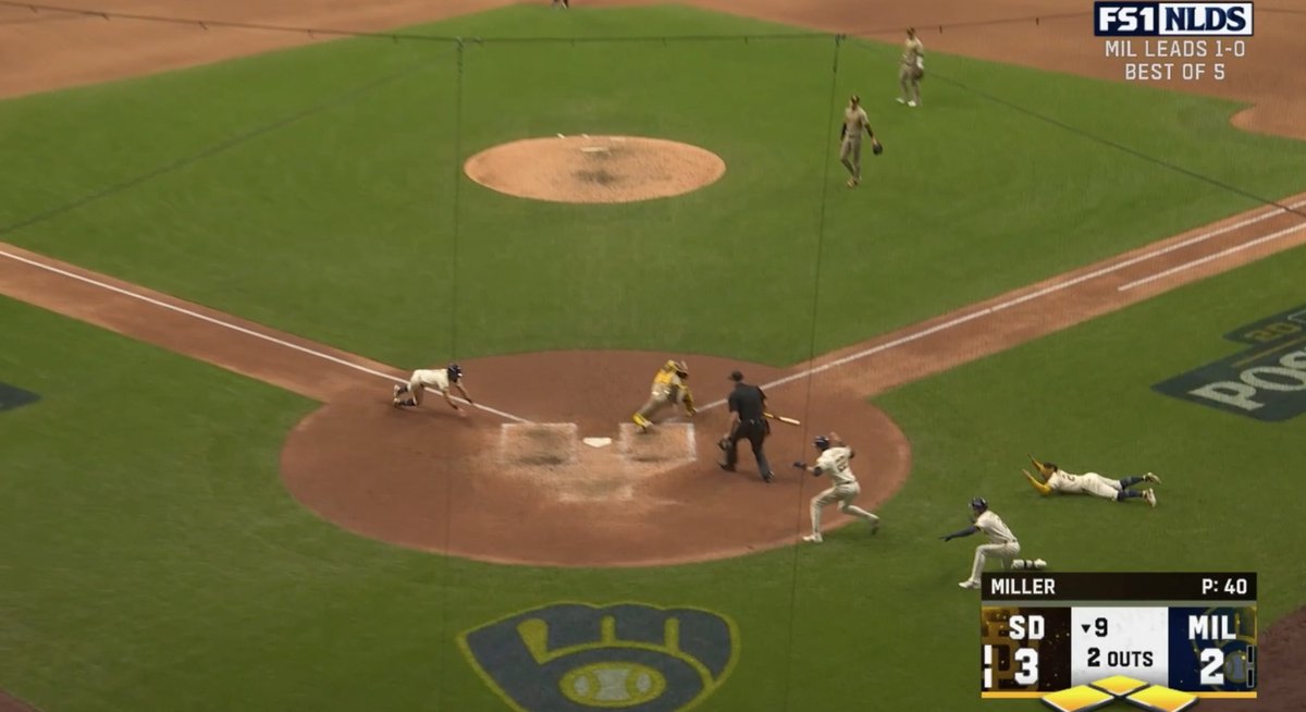 KedrickStumbris's tweet photo. This moment of Yelich, with Turang and Contreras popping out of the dugout, yelling for Sal to get down and slide lol https://t.co/S9FplCBdRR