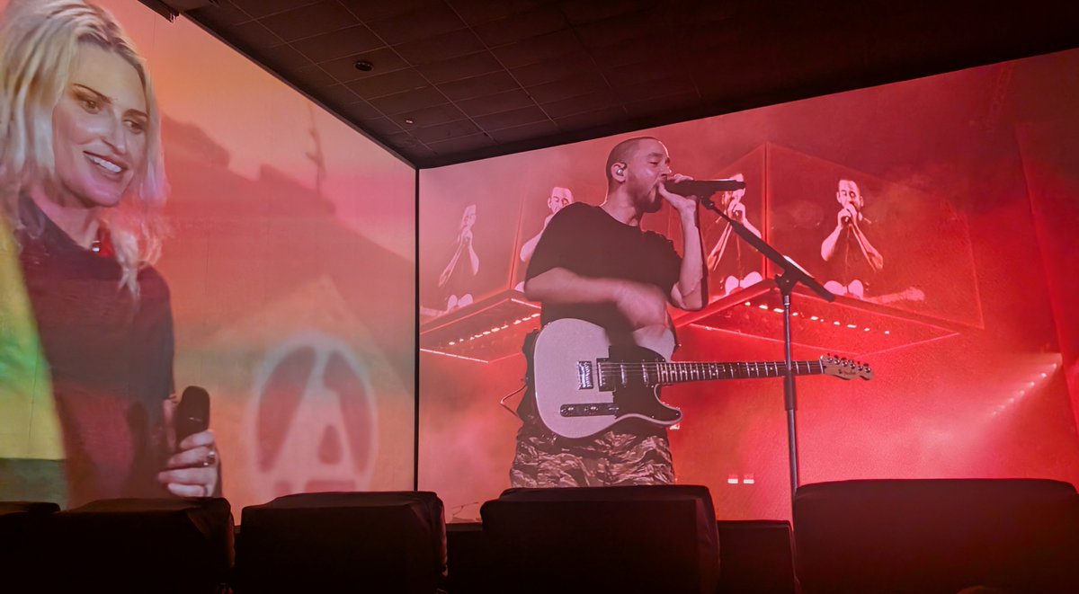 jayasherguy's tweet photo. Joined my son &amp; his friend to see LINKIN PARK: UNSHATTER in ScreenX (it wrapped around 3 walls of the theater). It was phenomenal! The concert footage was great &amp; it was beautiful to watch the band support each other, figuring out how to continue after a founding member's death. https://t.co/7v4MJjJOeL