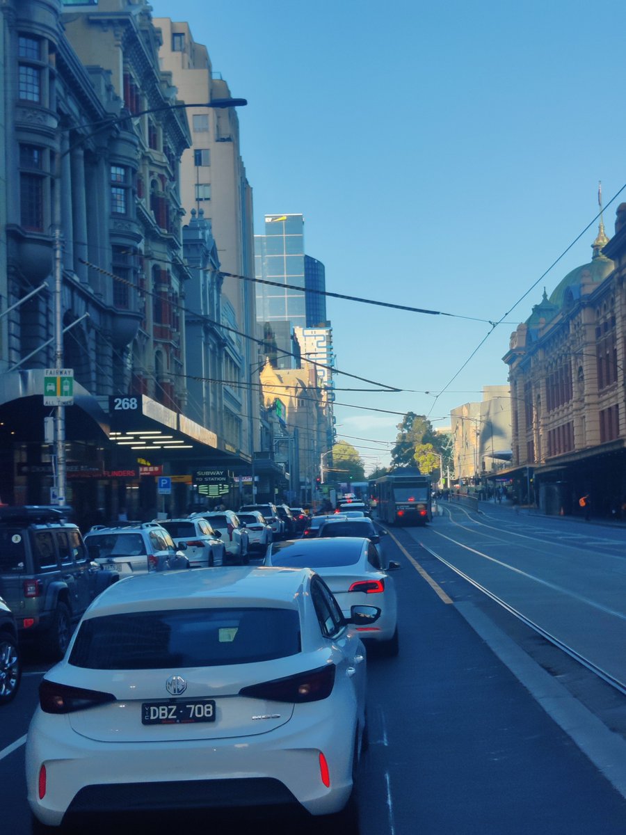 PierreVairo's tweet photo. Thank goodness they reopened Flinders St to traffic after it was closed due to metro tunnel works for 7 years. 

Where would all these cars have gone otherwise? 

Maybe now we can remove the Elizabeth St crossing so there's even less yucky pedestrians getting in the way!? https://t.co/qghcXPWlUr