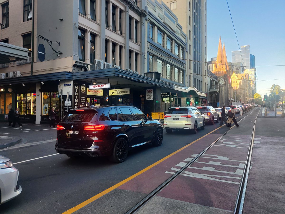 PierreVairo's tweet photo. Thank goodness they reopened Flinders St to traffic after it was closed due to metro tunnel works for 7 years. 

Where would all these cars have gone otherwise? 

Maybe now we can remove the Elizabeth St crossing so there's even less yucky pedestrians getting in the way!? https://t.co/qghcXPWlUr