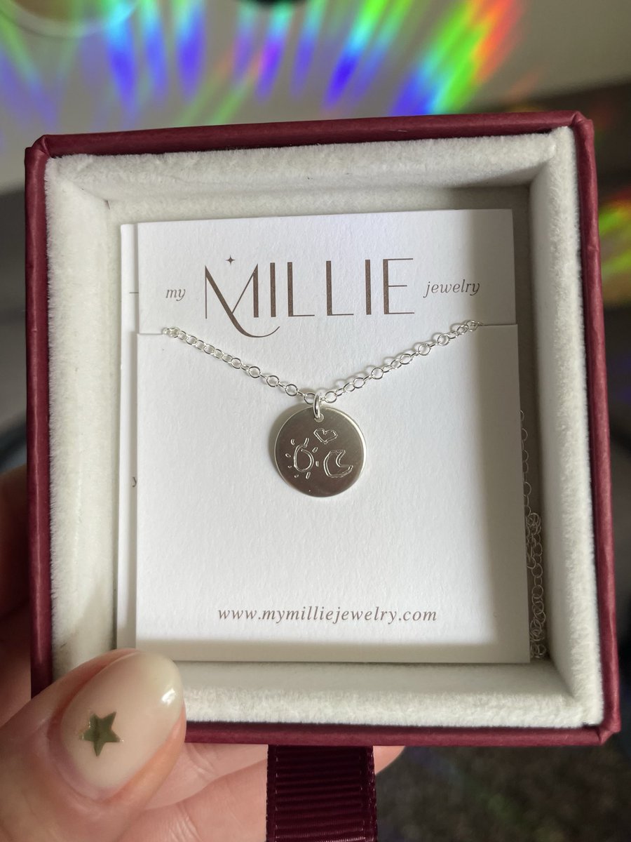 yeehawodyssey's tweet photo. got dan and phil to draw a sun and a moon during my m&amp;g and i got it turned into a necklace:) https://t.co/4a0pOXa5hw