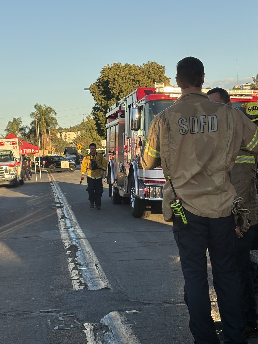 SDFD's tweet photo. Crews will remain on scene near Imperial and Market St after stopping a pair of vegetation fires covering three acres that threatened structures near Lincoln Park. The #MarketFire was reported late this afternoon, SDFD helicopters immediately responded.. (1/3) https://t.co/w9C5adExJu