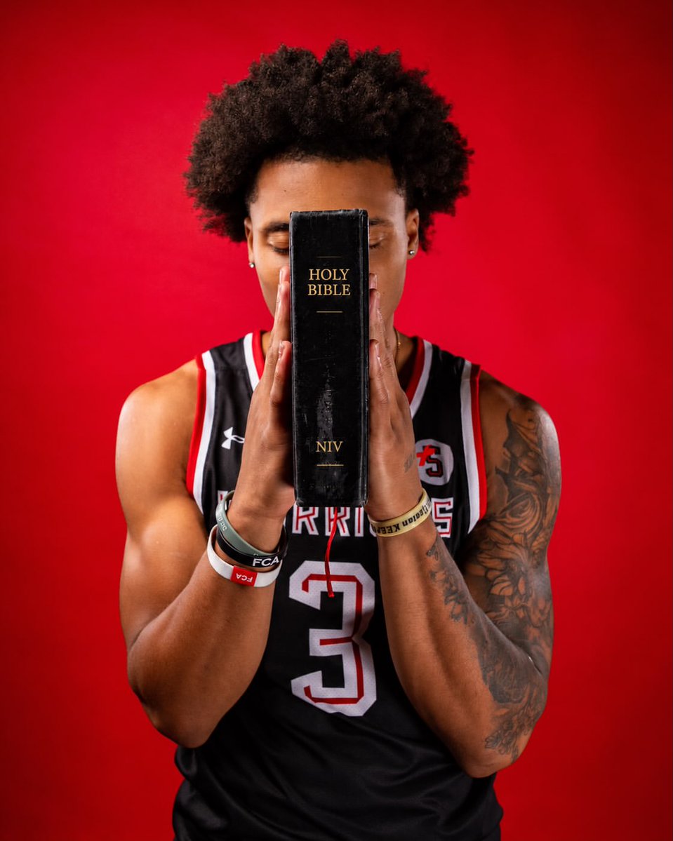 utdMaggie's tweet photo. Christian Pierre-Louis poses with a Bible in his hands during his photo shoot https://t.co/GACjOWcqnF
