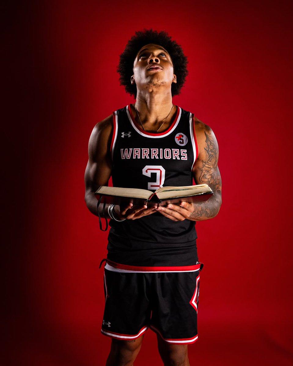 utdMaggie's tweet photo. Christian Pierre-Louis poses with a Bible in his hands during his photo shoot https://t.co/GACjOWcqnF