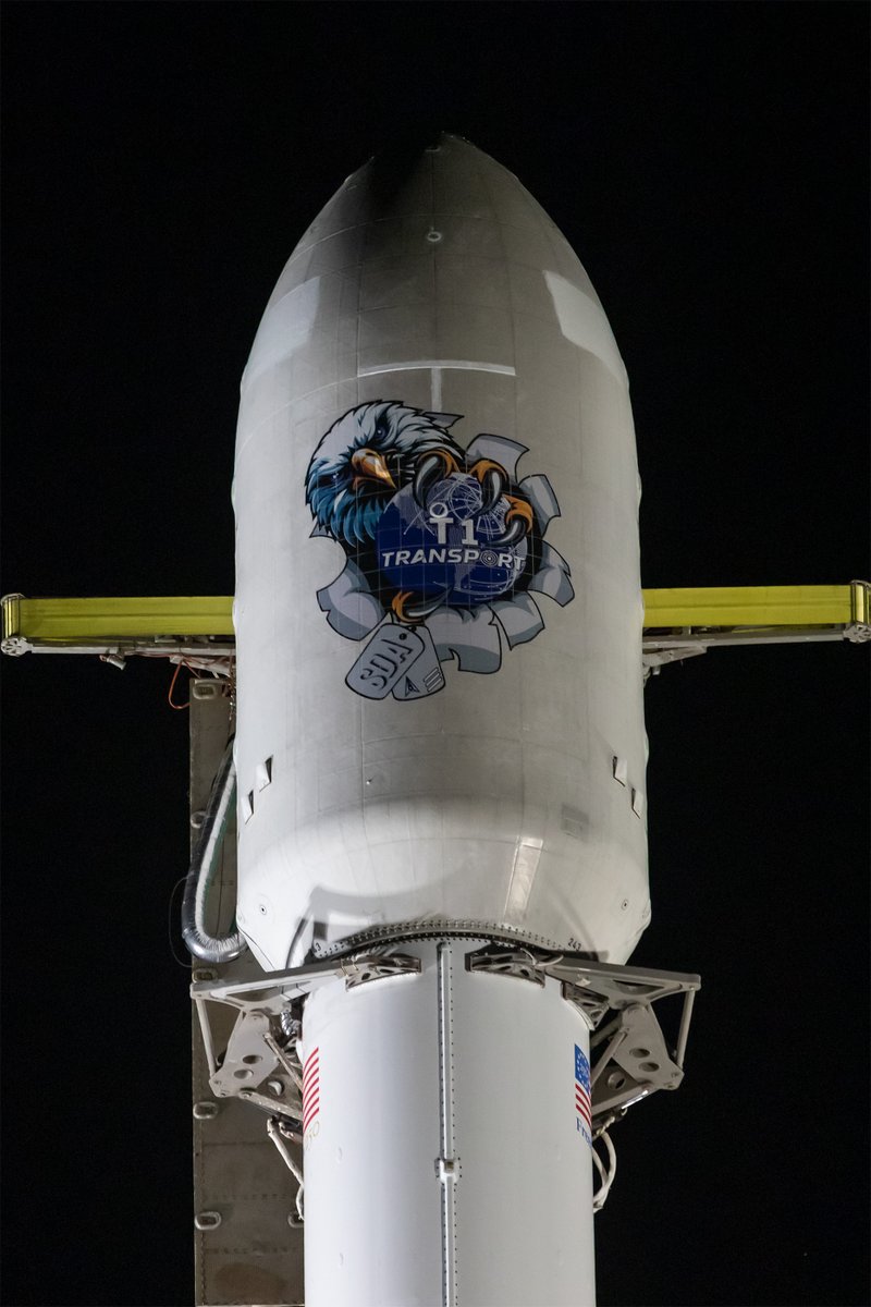 SpaceX's tweet photo. Falcon 9 is vertical at pad 4E in California ahead of tomorrow’s launch of the @SemperCitiusSDA's fourth Tranche 1 data transport mission. Liftoff is targeted for 1:17 a.m. PT → https://t.co/wz4JbJVy1b https://t.co/rWICZmMMRU