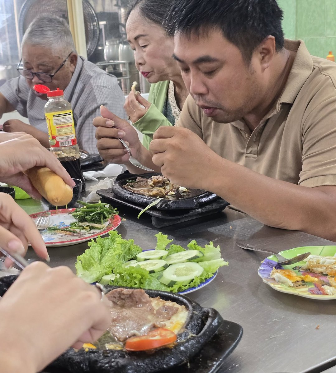 _brubees's tweet photo. Breakfast on our trips is bò né: sizzling beef, fried egg, pâté, warm baguette, herbs, and chilies. We stop where locals eat, not where tour buses park. DM us to book direct. https://t.co/cn9ajBy56C