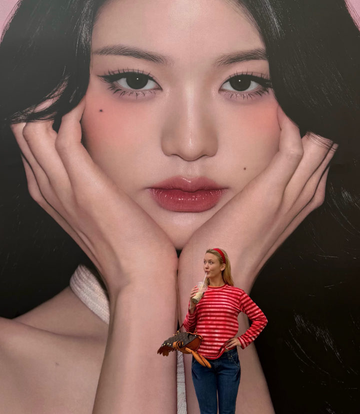 AboutMusicYT's tweet photo. Zara Larsson shares a new photo with Wonyoung's billboard during her stay in South Korea. https://t.co/XXn9kiXg6b