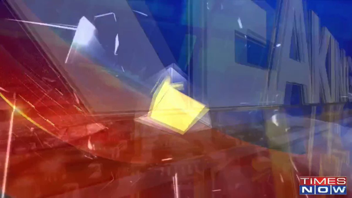 This is a screenshot from Times Now featuring the news program's stylized 3D logo graphics in red, blue, and yellow as a transition bumper. The image serves as a generic channel ident/branding visual that would appear during the news segment about BJP's announcement of 8 Rajya Sabha candidates from Uttar Pradesh.