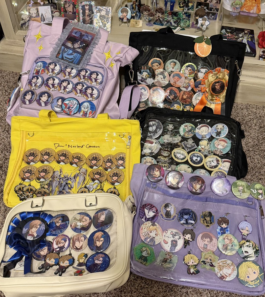 moonlitmoogle's tweet photo. I am putting together a video of my Code Geass merch for the anniversary. These are all my ita bags! I need to redo some, but I love them. 

#コードギアス 
#codegeass https://t.co/PYGU0w4yxh