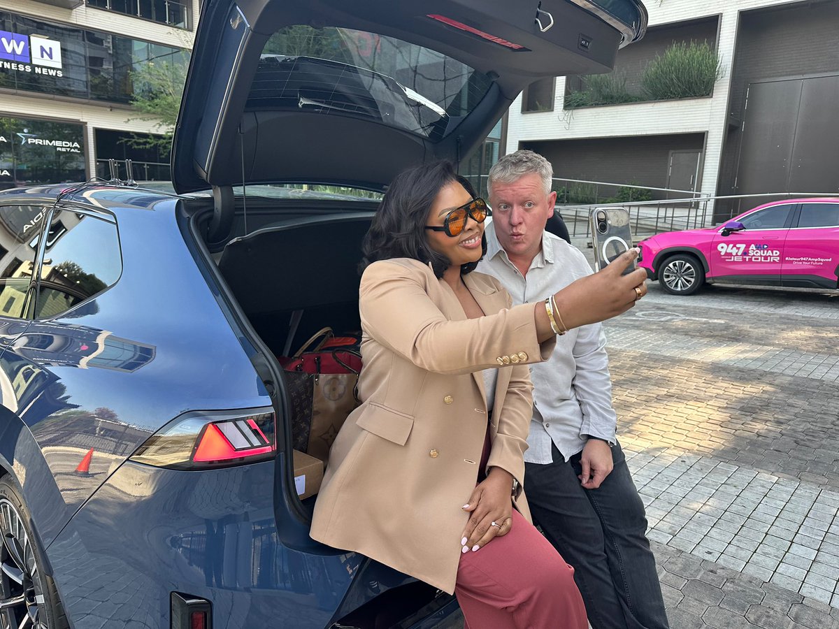 Anele's tweet photo. We are driving to Durban sana and @FrankieFire is lost already!!!! Why am I facing Limpopo 

We are in the brand new BMW iX3 

805ks from a single charge! 

Journey with us. 

Tune in we are live from the road 

#Aneleandtheclubon947 https://t.co/fqdTsK5ayA