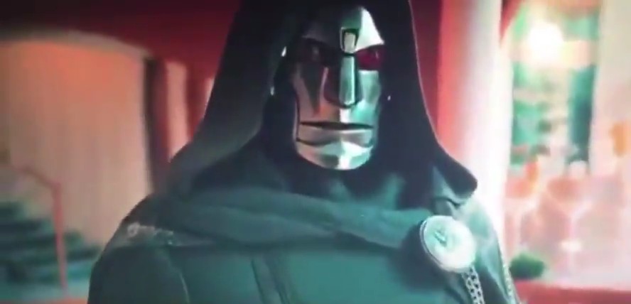 A character in a dark hooded cloak wears a metallic silver mask with glowing red eyes, with a circular emblem on their chest.