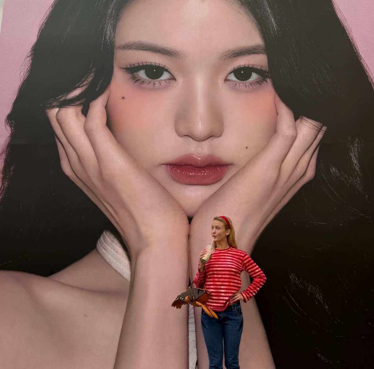 DiveBasee's tweet photo. Zara Larsson posing with an IVE's Wonyoung billboard on her visit to South Korea. https://t.co/YqXGvFWUz1