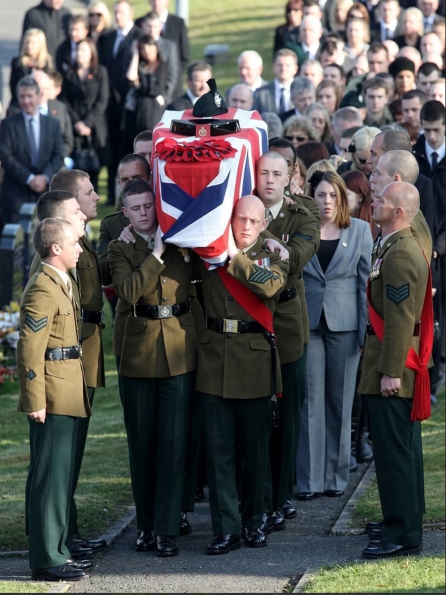 Cairnlodge1's tweet photo. Source: UK PULSE 🇬🇧

“Almost a year after burying his baby daughter, #LanceCorporal #StephenMcKee was laid to rest beside her.” 🕊️

There are some stories of military service that are difficult to read without thinking first of the person behind the uniform. Stephen McKee’s is one of them. He was a 27-year-old husband, father, son and brother from #Banbridge, #CountyDown, whose life was marked not only by his commitment to the Army, but by a family tragedy that he had already endured before he lost his own life in #Afghanistan.

In 2010, Stephen and his wife Carley suffered the devastating loss of their baby daughter, Keeley, who died just two days after she was born. The Ministry of Defence later described the enormous strength Stephen had shown during that deeply difficult period. He remained devoted to his family while continuing his military career with The #RoyalIrishRegiment. ☘️🇬🇧

When Stephen was killed less than a year later, the tragedy became even more painful. On 9th March 2011, while serving with #1stBattalion, The Royal Irish Regiment, on operations in #Helmand Province, his vehicle struck an improvised explosive device during an operation in the northern Dashte area of Nad ‘Ali district. Stephen was killed in the blast.

His military journey had begun in 2003, when he joined #3rdBattalion, The Royal Irish Regiment as a part-time soldier. After the Home Service was disbanded, he transferred to the 1st Battalion and joined them at Tern Hill in April 2007. He served in B Company before moving to the Machine Gun Platoon in D Company in 2010. He had already deployed to Afghanistan on #OperationHERRICK 8 in 2008 and, shortly before his final deployment, had completed his Machine Gun Section Commanders Course.

Those who served with Stephen remembered more than his professional ability. His commanders described him as conscientious, generous, hard-working and reliable, while fellow soldiers remembered his warmth, humour and unmistakable smile. He was known as someone who would help others without hesitation and who cared deeply about the people around him.

His family connection to the regiment was also extraordinary. Two of his brothers, a cousin and his father-in-law served in the 1st Battalion, while another brother served in the 2nd Battalion. His younger brother Michael was among those who reached the scene after the blast that killed Stephen.

When Stephen's #funeral took place in Banbridge, thousands came to pay their respects. An estimated 10,000 mourners lined the town as he was carried to his final resting place with full military honours. But perhaps the most #poignant detail was where he was laid to rest: beside his little daughter Keeley in Banbridge New Cemetery. After everything Stephen and Carley had endured, father and daughter were finally together again.

Stephen McKee was not simply a name on a casualty list. He was a young husband who had known the unbearable pain of losing a child, a soldier who continued to serve, a brother within a family deeply connected to his regiment, and a man remembered by his comrades for his kindness, professionalism and character.

His life was cut short in Afghanistan, but the place where he was finally laid to rest tells a quieter and deeply human part of his story. Beside the daughter he had lost before him, Stephen found his final resting place.

🇬🇧 Forever Together — Lance Corporal Stephen McKee, 1st Battalion The Royal Irish Regiment. Killed in Afghanistan, 9th March 2011, aged 27. Laid to rest beside his daughter Keeley in Banbridge, County Down. 🌺

📸 Photographs: Lance Corporal Stephen McKee in uniform; his funeral procession and coffin being carried in Banbridge; and other verified photographs from his military service and funeral.

 #ukmilitary #UKPulse #LestWeForget #BritishArmy #FaughABallagh #ClearTgeWat #Ranger 🌺☘️🇬🇧