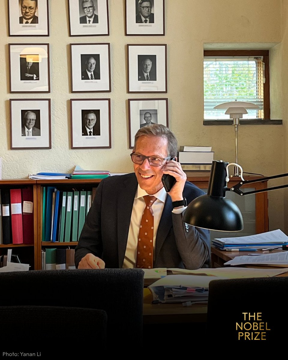 NobelPrize's tweet photo. Who is receiving exciting news from Thomas Perlmann, the secretary of the medicine committee?

Find out who will be awarded this year’s #NobelPrize in Physiology or Medicine – we’re moments away from breaking the news. https://t.co/GqRTVXC86j