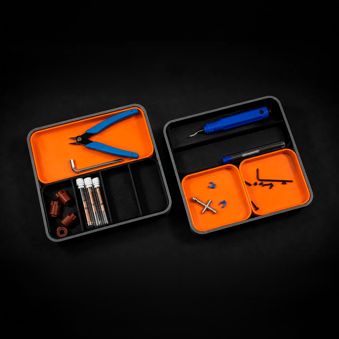 printablescom's tweet photo. Whether you're fixing a 3D printer, building an RC car, or soldering electronics, the Build Tray by Polymorphic keeps all your screws, tools, and tiny parts right where you need them. It's completely modular, so you can customize the layout. 🛠️ https://t.co/2P7XkPrNwk https://t.co/2pClQ85hHV