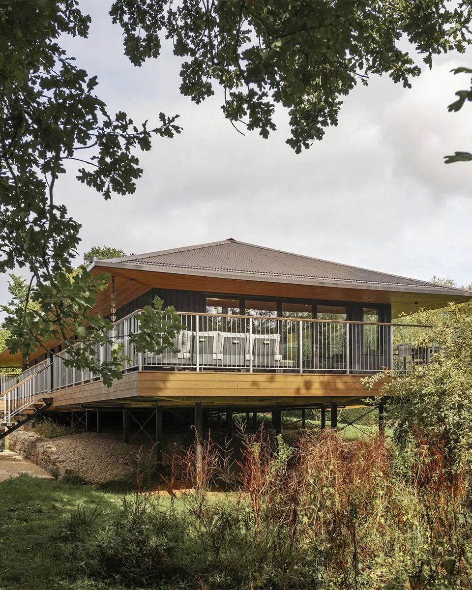 BuildItMagazine's tweet photo. Inspired by his travels, Mike Cowen built a striking lodge-style eco home on a sensitive riverbank plot in Devon: https://t.co/GxYH8ZeLpz https://t.co/Zy9zlkB5ig