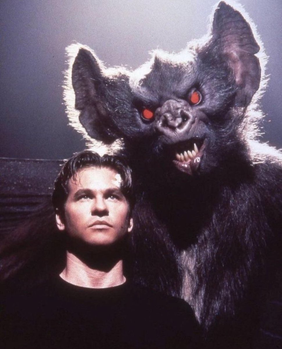 RealEmirHan's tweet photo. Val Kilmer and a giant animatronic bat from the deleted dream scene for “BATMAN FOREVER” (1995) https://t.co/VIUHPezCSW