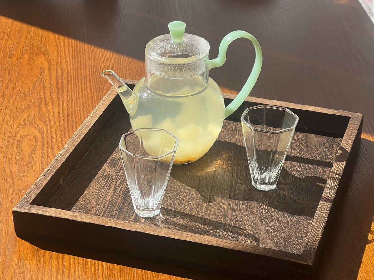 Sanane153034's tweet photo. [A stylish vintage teacup with an elegant tea strainer sits on a light wood table, exuding a quiet, cozy vibe for a slow afternoon tea moment.] https://t.co/umVZb7PNSZ