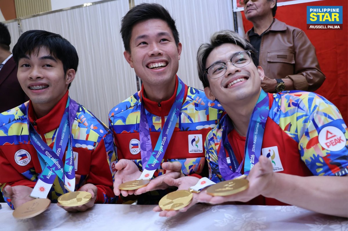PhilippineStar's tweet photo. THE GOLDEN BOYS OF TEAM PH 🥇🇵🇭

Carlos Yulo, EJ Obiena, and Jeus Yape are all smiles as they pose with their gold medals from the 2026 Asian Games during the Heroes’ Welcome dinner for Team Philippines on Monday. 

Yulo delivered the country’s first two gold medals in the men’s floor exercise and vault events, followed by Obiena’s victory in the men’s pole vault and Yape’s triumph in mixed individual virtual taekwondo. (Photos by Russell Palma/The Philippine STAR)