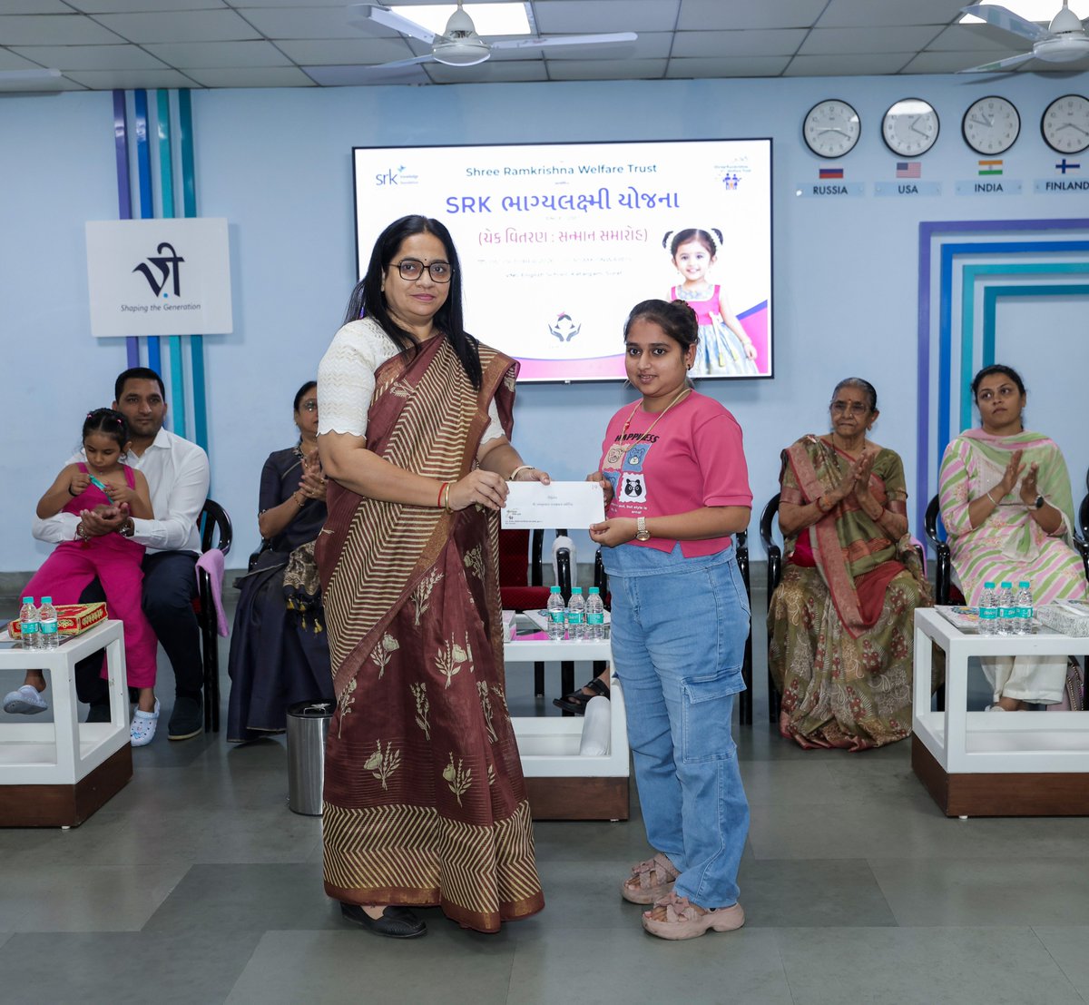 GovindLDholakia's tweet photo. 19 years ago, SRK Knowledge Foundation (@srk_kf)  began the #BhagyalaxmiYojana to support families in giving their daughters the opportunities they deserve to learn, grow and move ahead in life.

What started with supporting 9 families has now reached 24 families. Every family supported through this initiative is a reminder that when a girl is given the right opportunities, she can shape not only her own life, but the future of an entire family. I have always believed that #givingbacktosociety does not require going far, sometimes it simply means standing beside a family when they need support the most.

It was a pleasure to have Dr. Niharika Patel ji and Smt. Mitaben Goswami ji, Hon. Education Inspectors working closely with the District Education Office (DEO), Surat join us in our event. Their presence significance to the occassion that celebrated daughters, supporting families and believing in the possibilities that lie ahead.

Bhagyalaxmi Yojana continues to be a meaningful step towards empowering daughters and strengthening families. May every girl grow up with the confidence to dream, the opportunity to learn and the freedom to build her own future.

#purepurpose #empoweringwomen #EmpoweringDaughters #NiharikaPatel #MitabenGoswami