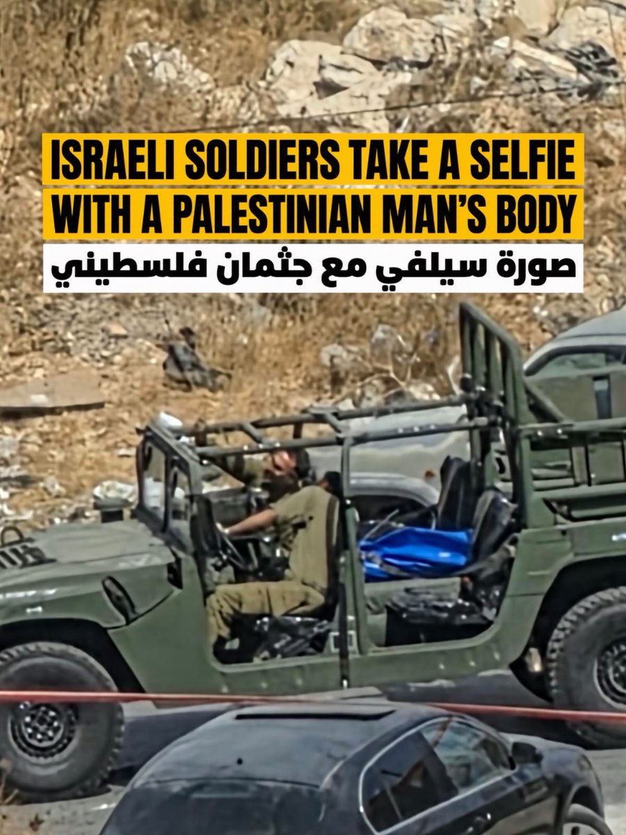 EyeonPalestine's tweet photo. Israeli soldiers take a selfie with the body of a young Palestinian man killed after they opened fire on his vehicle at the entrance to Bani Na’im, near Hebron. https://t.co/7VKdLqzHy8
