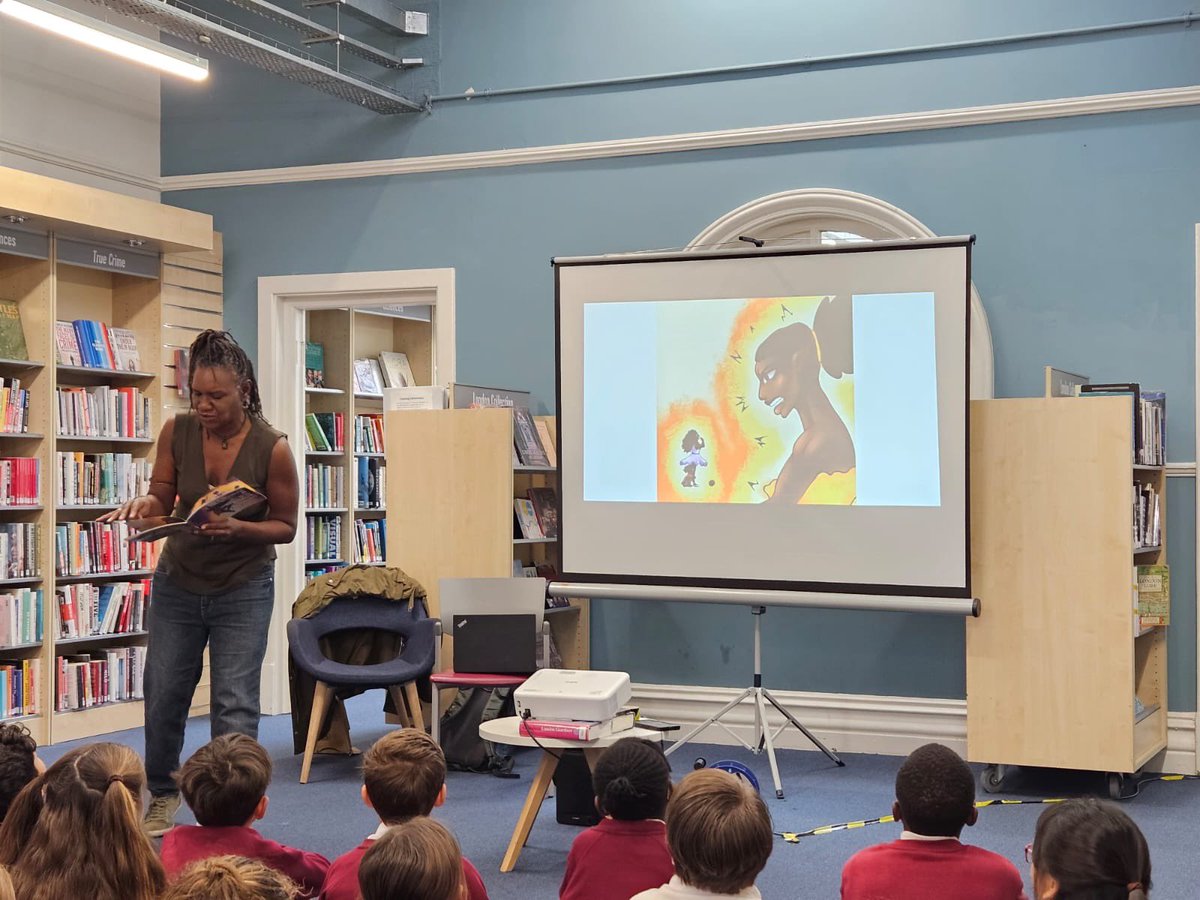 ElthamLibrary's tweet photo. Children from Eltham CE School enjoyed an interactive storytelling session last week in celebration of #BlackHistoryMonth at #ElthamLibrary. We learnt about Black British Ballet through the book ‘Onisere and the Ballet Queen’ 🩰 with dance and movement throughout. 📚 https://t.co/Bh8GHfGBaV