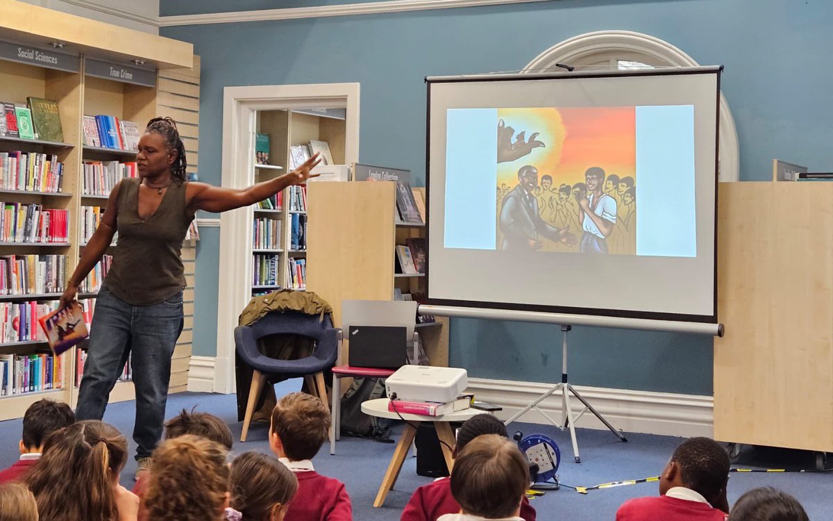 ElthamLibrary's tweet photo. Children from Eltham CE School enjoyed an interactive storytelling session last week in celebration of #BlackHistoryMonth at #ElthamLibrary. We learnt about Black British Ballet through the book ‘Onisere and the Ballet Queen’ 🩰 with dance and movement throughout. 📚 https://t.co/Bh8GHfGBaV