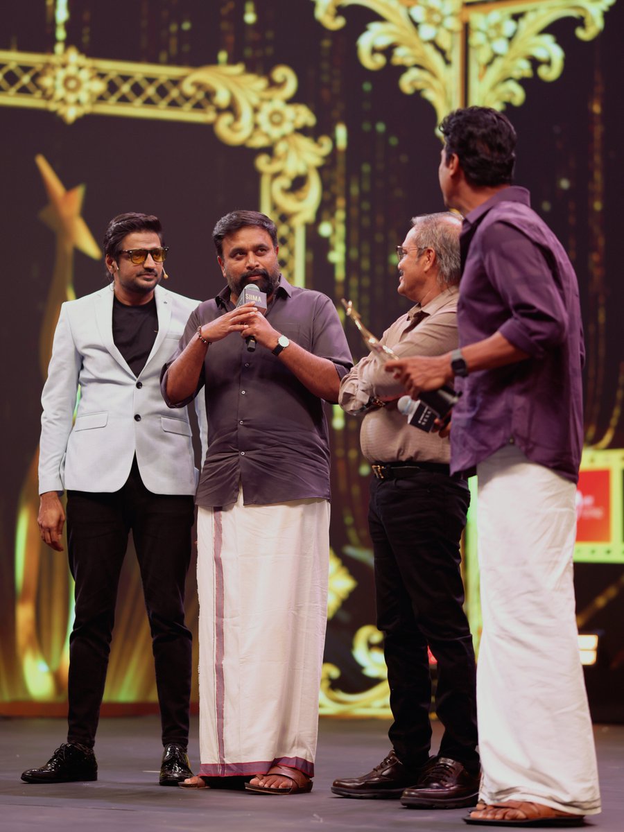 siima's tweet photo. Candid moments on stage as @SasikumarDir and @samuthirakanip share a fun moment with @actorsathish.

#NEXASIIMA2026 #SIIMA2026 #TamilCinema #SouthCinema #CinemaMoments https://t.co/boqCr2t0cp