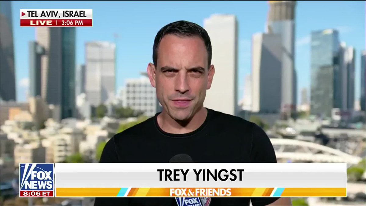 A Fox News reporter, identified as 'TREY YINGST' on 'FOX & FRIENDS', broadcasts live from Tel Aviv, Israel at 3:06 PM, with the city's skyline visible behind him.